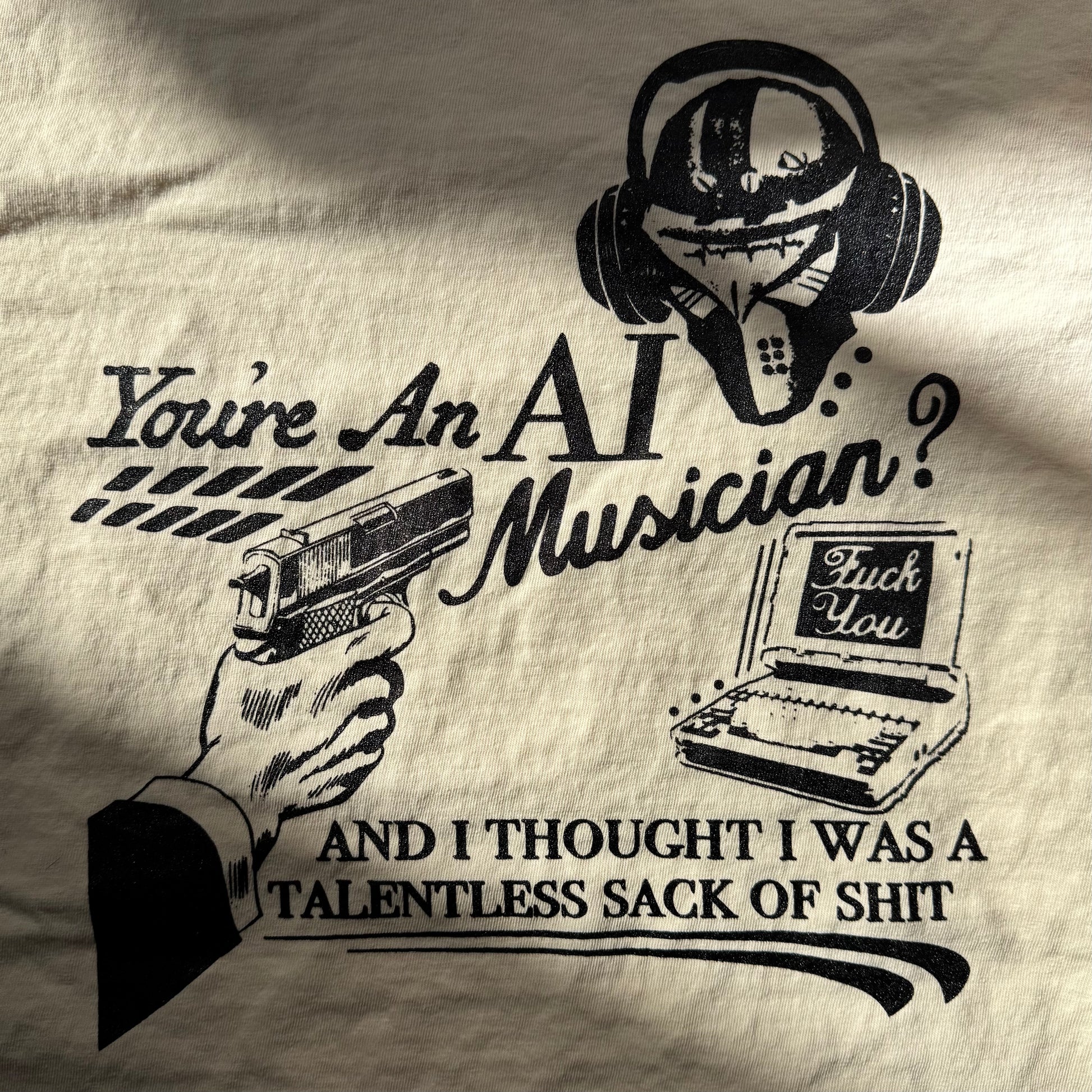 T-shirt with graphic design and text on a beige background