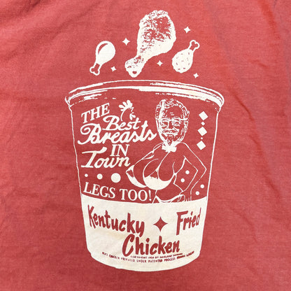 Red t-shirt with white Kentucky Fried Chicken graphic on a red background