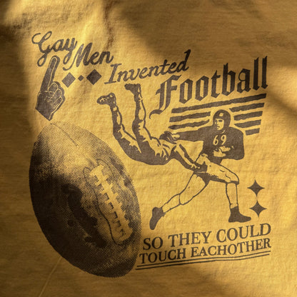 T-shirt with graphic of a football player and text on a brown background