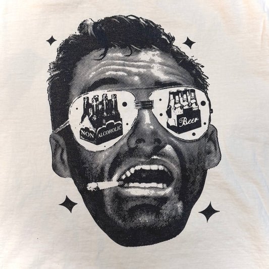 Black and white illustration of a person wearing sunglasses with text on lenses, on a light background.